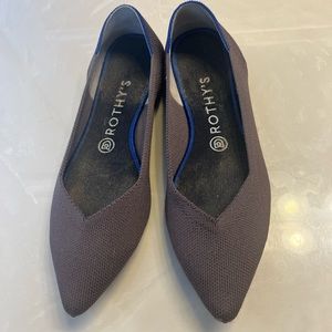 Rothy’s pointed toe flats in a grape color size 9